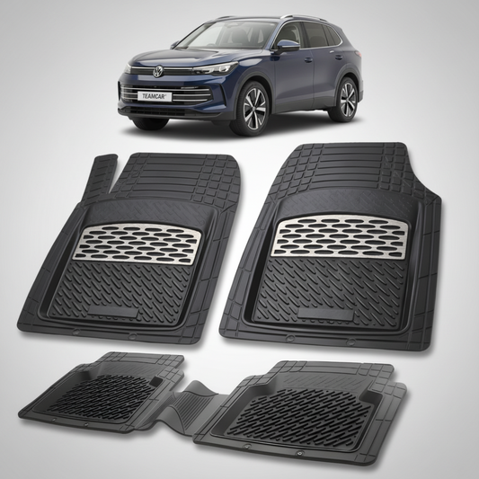 set de covorase din cauciuc negre cu accente gri cu un volkswagen tiguan bw3 suv albastru inchis in fundal