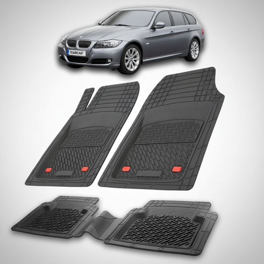 Set of black car floor mats with a silver car in the background