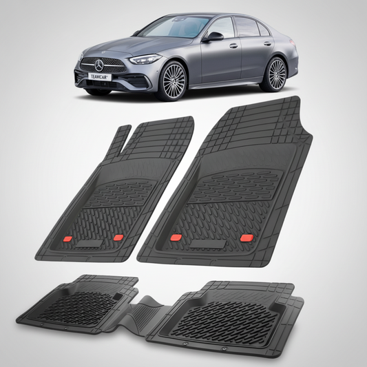 Set of black car floor mats with a Mercedes-Benz car in the background