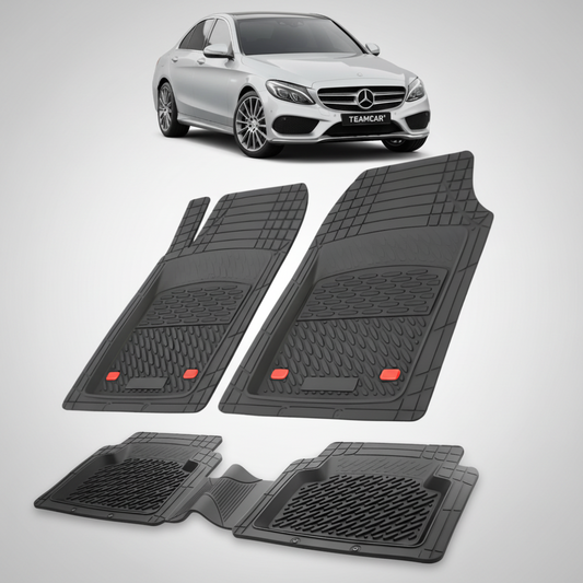 Set of black car floor mats with a Mercedes-Benz car in the background.