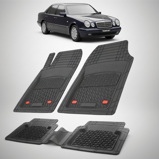 Set of black car floor mats with a black car in the background