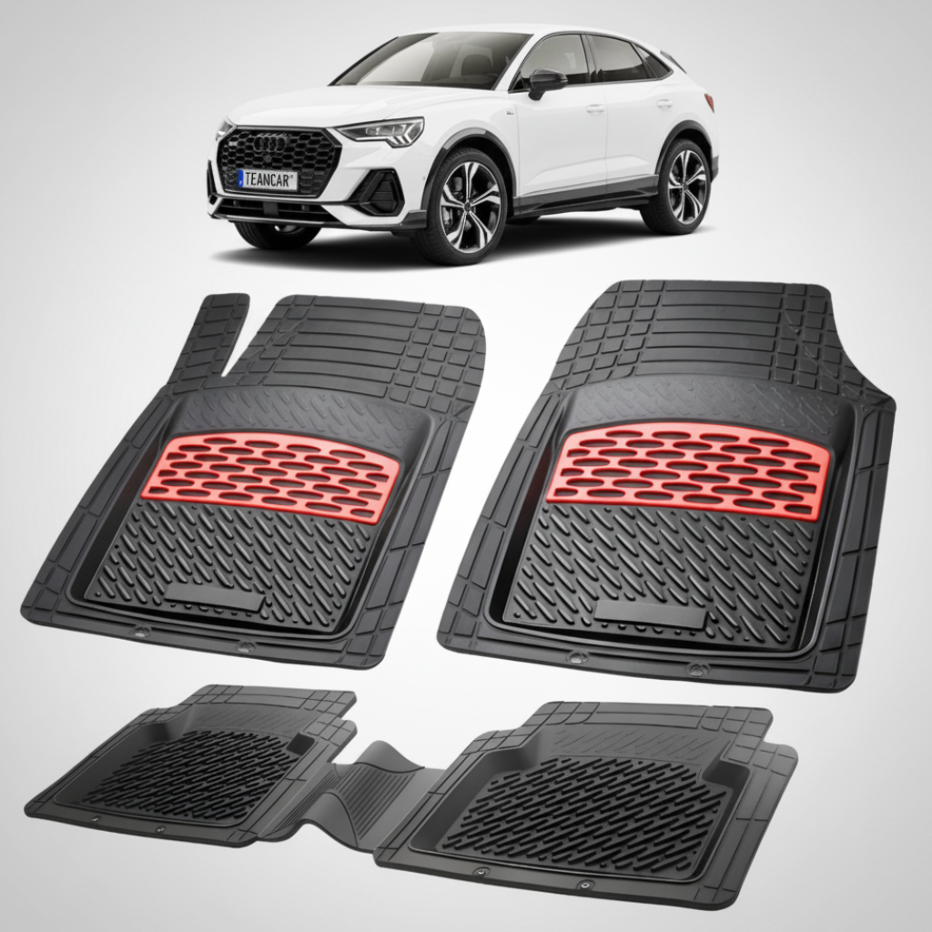 Fekete gumiszőnyegek piros díszítéssel, háttérben egy fehér Audi Q3 Sportback F3 SUV kupéval