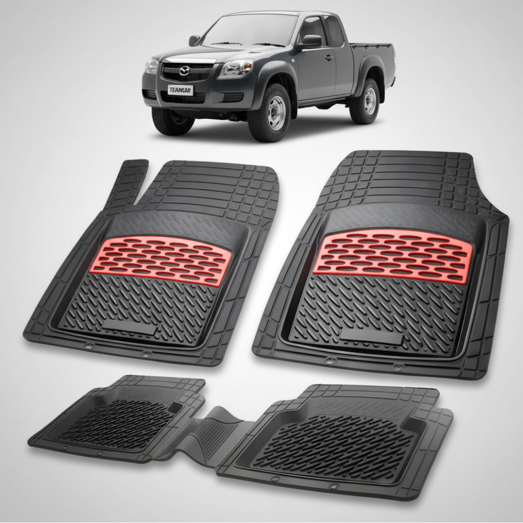 set de covorase din cauciuc negre cu accente rosii cu o mazda tb-50 j97 pick-up gri inchis metalizat in fundal