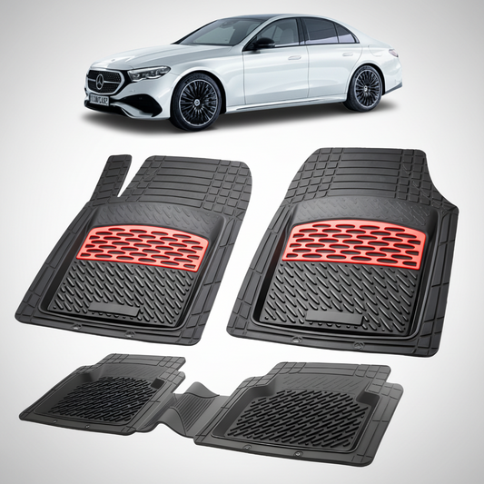 Set of black car floor mats with red accents on a white background, featuring a white car.