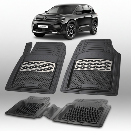 Set of black car floor mats with a Citroen car in the background