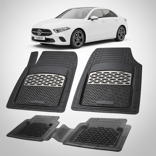 Set of black car floor mats with a white car in the background