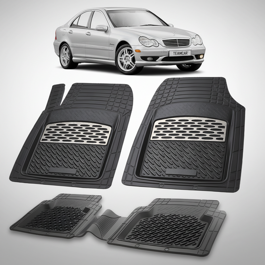 Set of black car floor mats with a silver car in the background