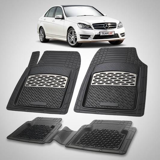 Set of black car floor mats with a white car in the background
