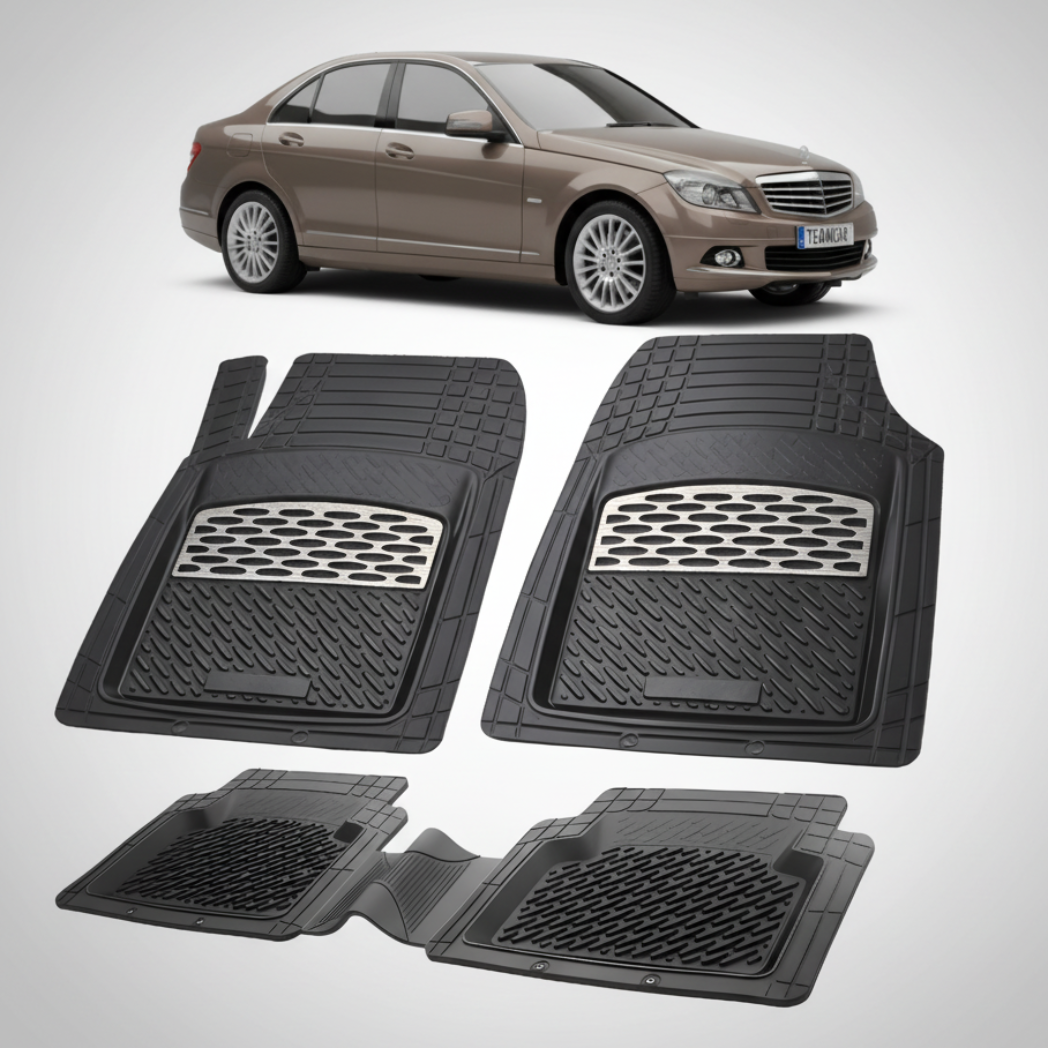 Set of black car floor mats with a car in the background