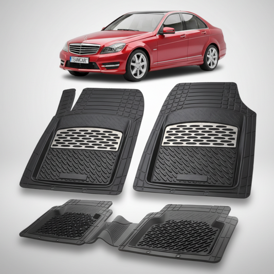 Set of black car floor mats with a red car in the background