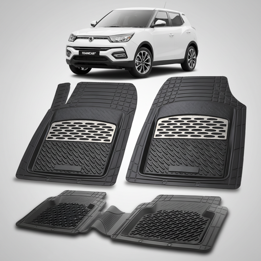 Set of black car floor mats with a white SUV in the background