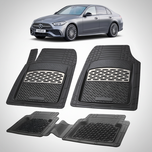 Set of black car floor mats with a Mercedes-Benz car in the background