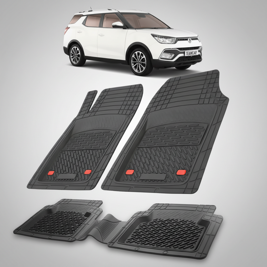 Set of black car floor mats with a white SUV in the background