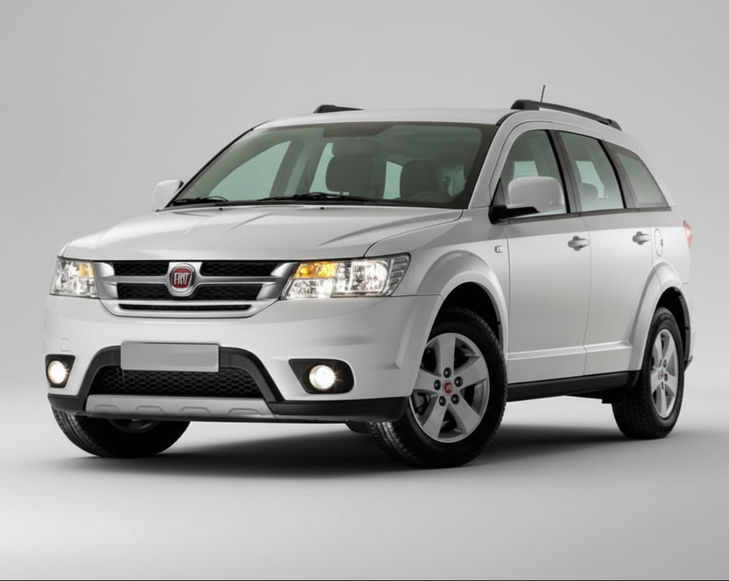 Silver Fiat Freemont SUV on a white background