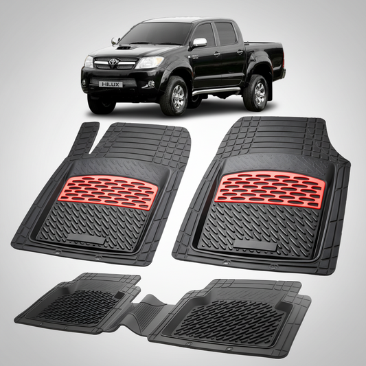 Set of black car floor mats with red accents on a white background, featuring a Toyota Hilux.
