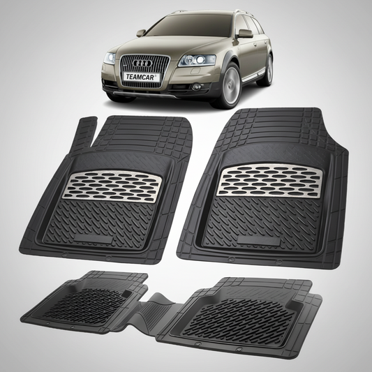 Set of black car floor mats with an Audi vehicle in the background