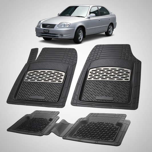 Set of black car floor mats with a silver car in the background