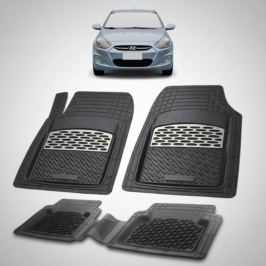 Set of black car floor mats with a Hyundai car in the background