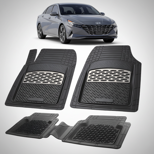 Set of black car floor mats with a car in the background