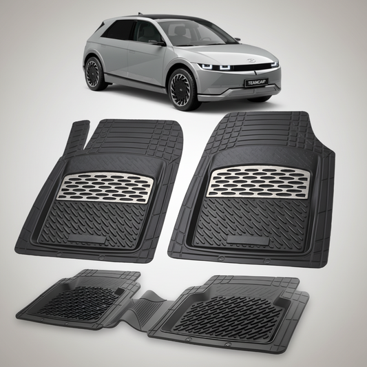 Set of black car floor mats with a car in the background