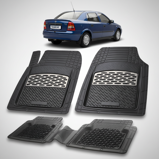 Set of black car floor mats with a car in the background