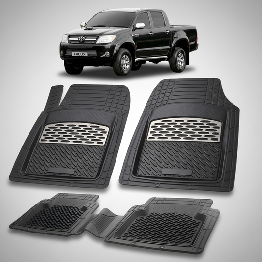 Set of black car floor mats with a Toyota Hilux in the background
