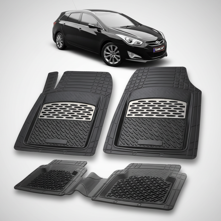 Set of black car floor mats with a car in the background