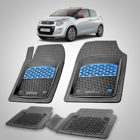 Set of car floor mats with a Citroen car in the background