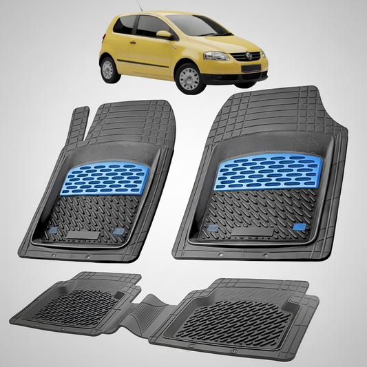 Set of car floor mats with a yellow car in the background
