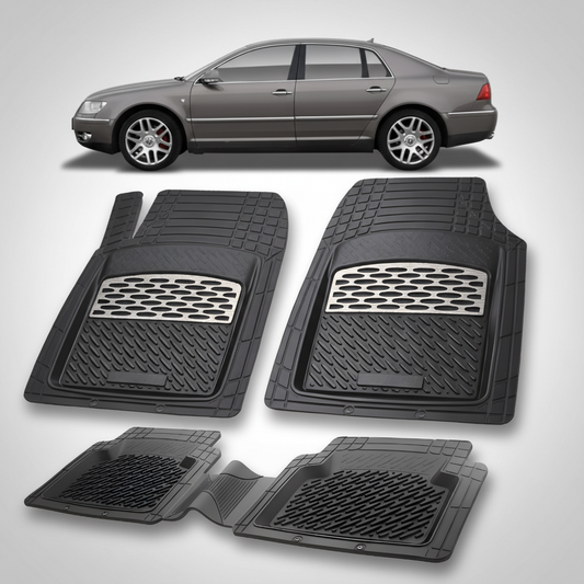 Set of black car floor mats with a car in the background