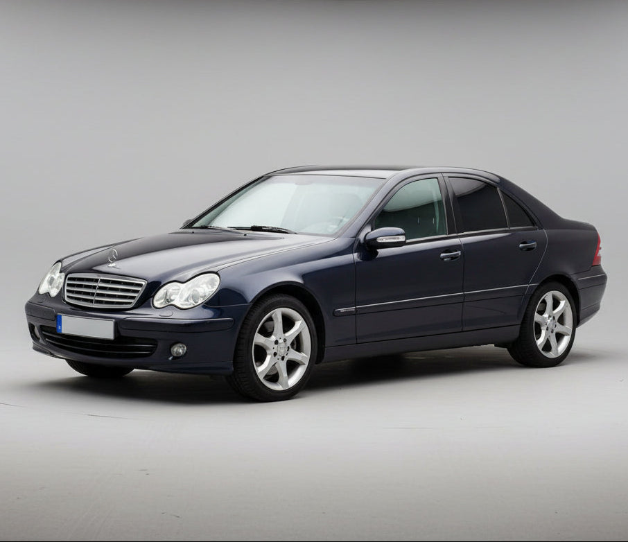 Black Mercedes-Benz car on a gray background