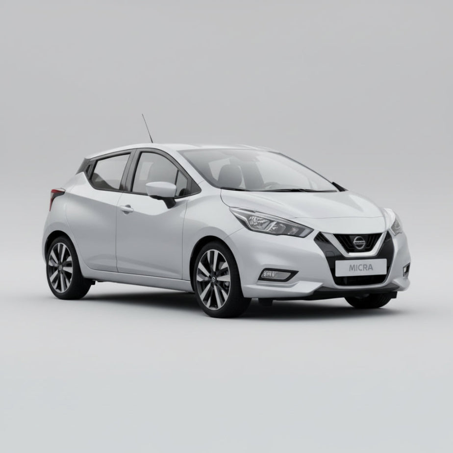 White Nissan Micra car on a gray background
